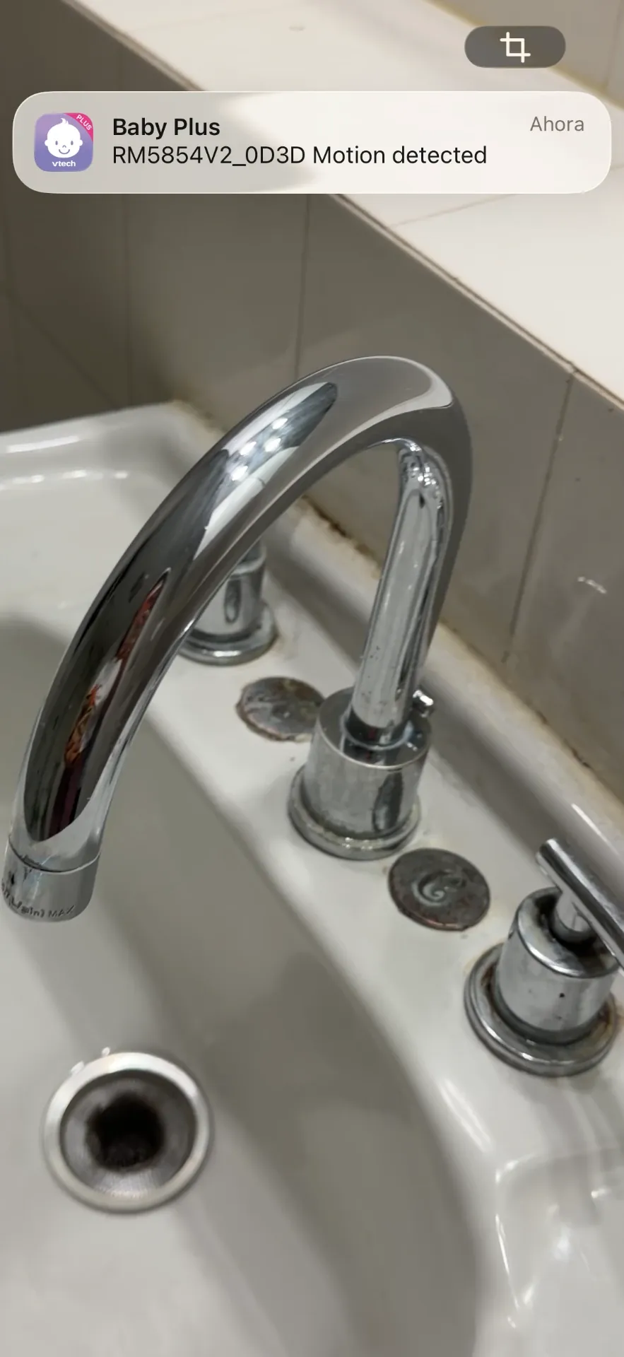 Spotless white bathroom pedestal sink after a deep cleaning by ISA Cleaning Services in Nassau County, Long Island